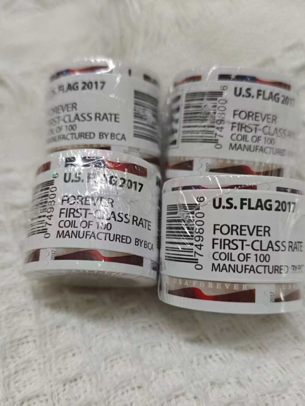 10 rolls of U.S. Postal Service stamps, totaling 1,000 brand new stamps.